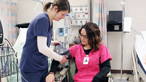 Medical Assistant student practice their techniques.
