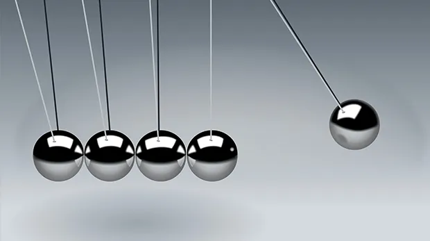 Metal balls swinging through physics