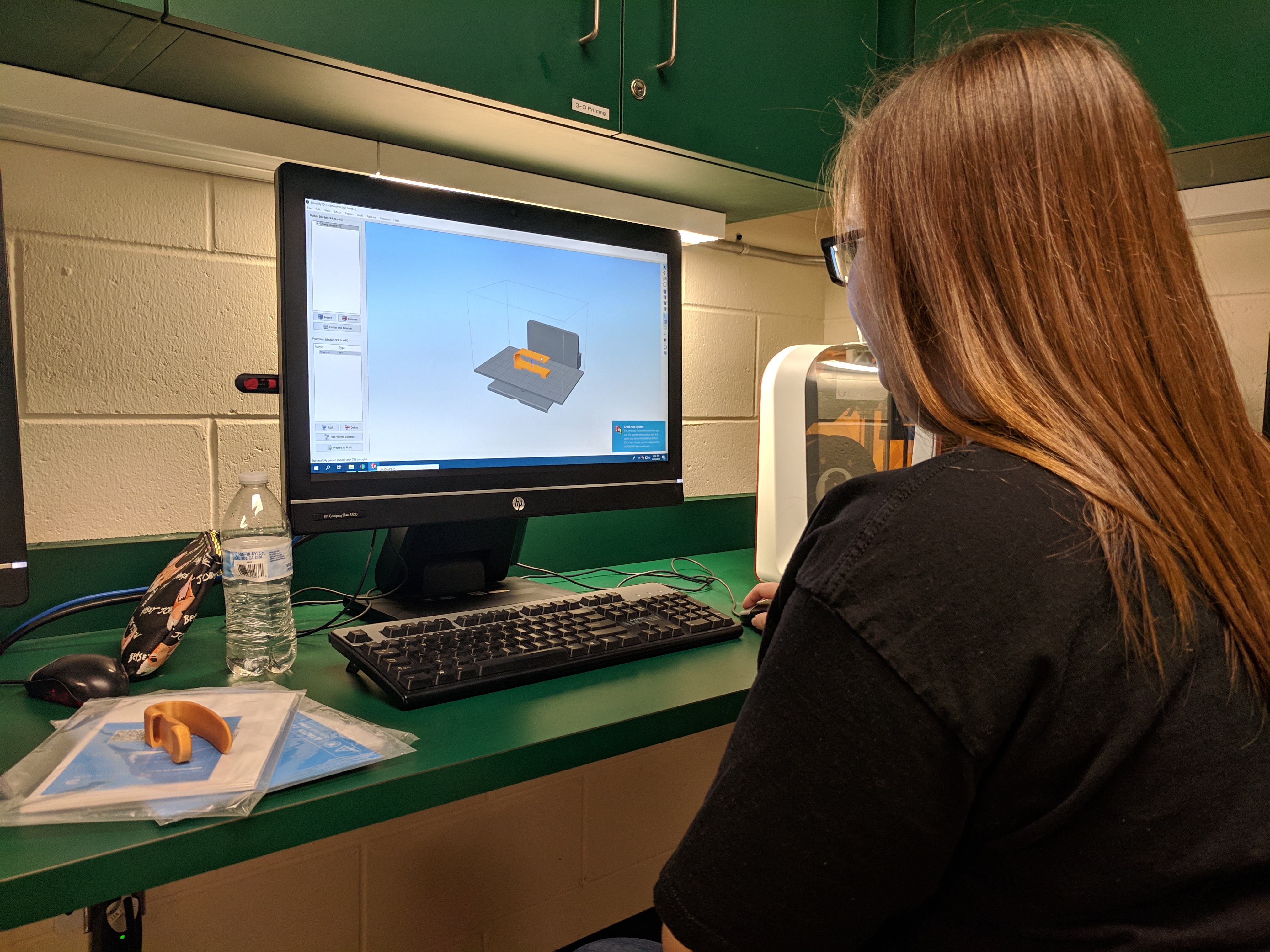 Beth Curtis re-engineers a gripping tool in SolidWorks.