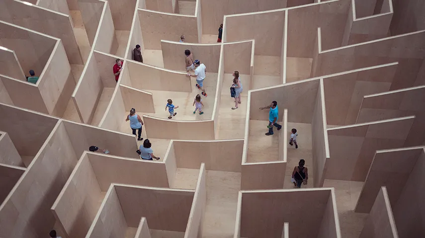 People navigating a maze 
