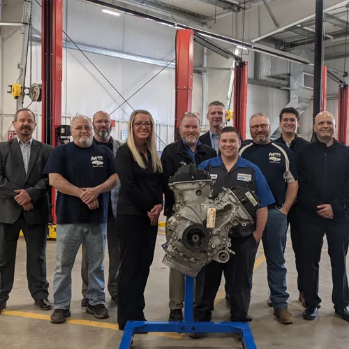 Midland Ford Lincoln delivers engine donation to Automotive & Diesel Service Lab.